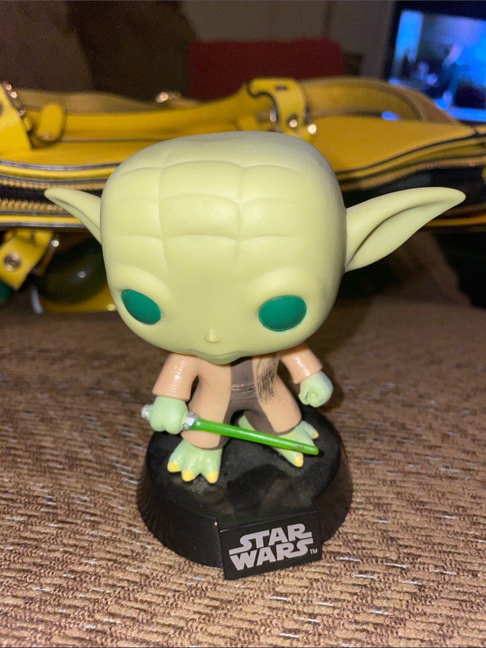Funko Star Wars Yoda Vinyl Figure in Pale Green with Teal Eyes and Brown Robe